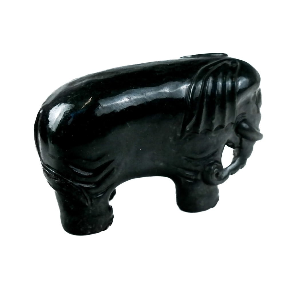 Modern Archaic-Style Jade Elephant in Rosewood Box: A modern Archaic-style jade elephant in original rosewood box. [Box: 7 3/4" H x 4 1/2" W]. Provenance: From the Estate of Baroness Gabriele Langer von Langendorff.