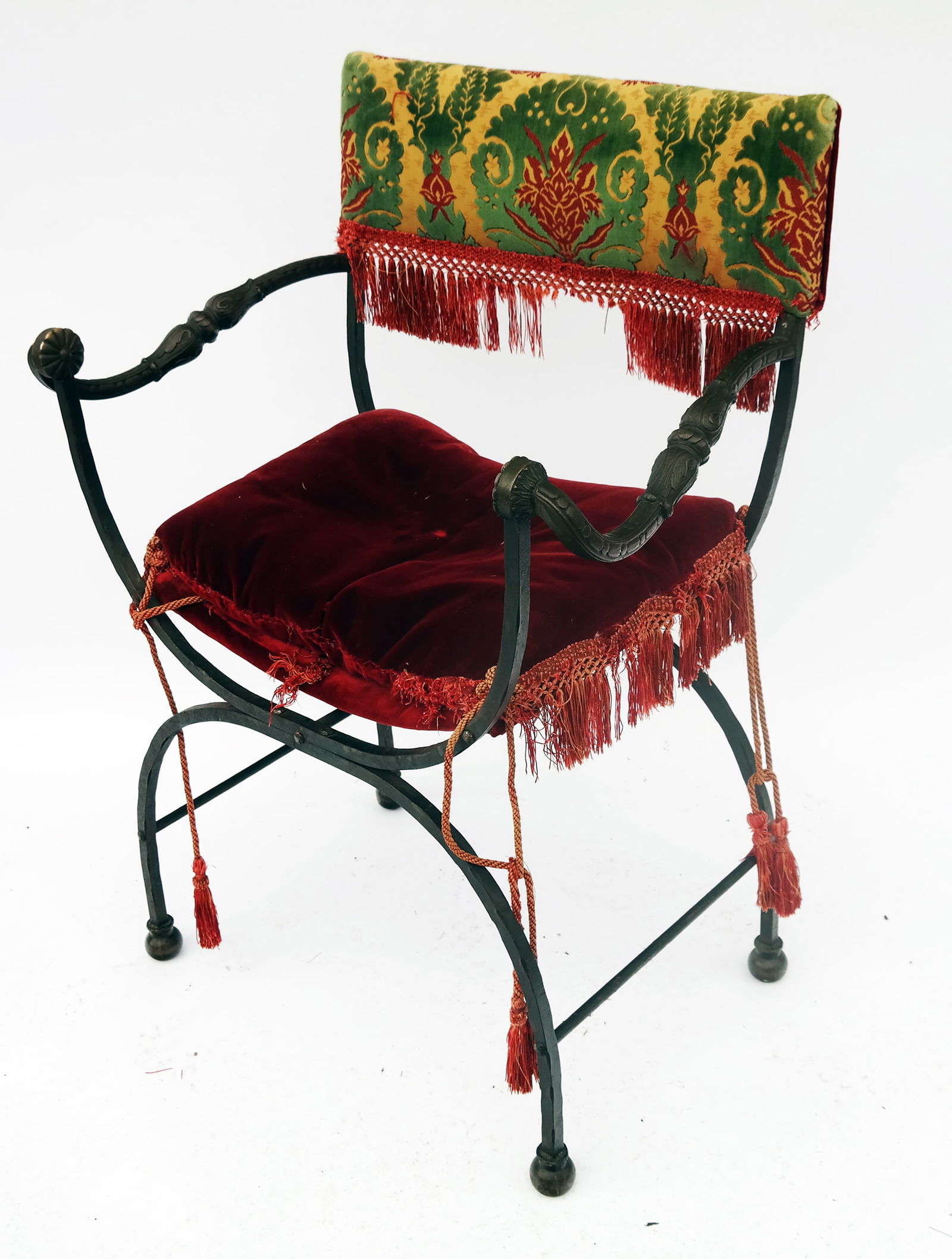 Roman Style Patinated Bronze Dantesca Armchair: 19th century ornately upholstered bronze Dantesca (Dante) hip-joint chair of Savonarola outline with curule-form base. [39" H x 29" W]. Provenance: From the Estate of Baroness Gabriele Langer von Lang