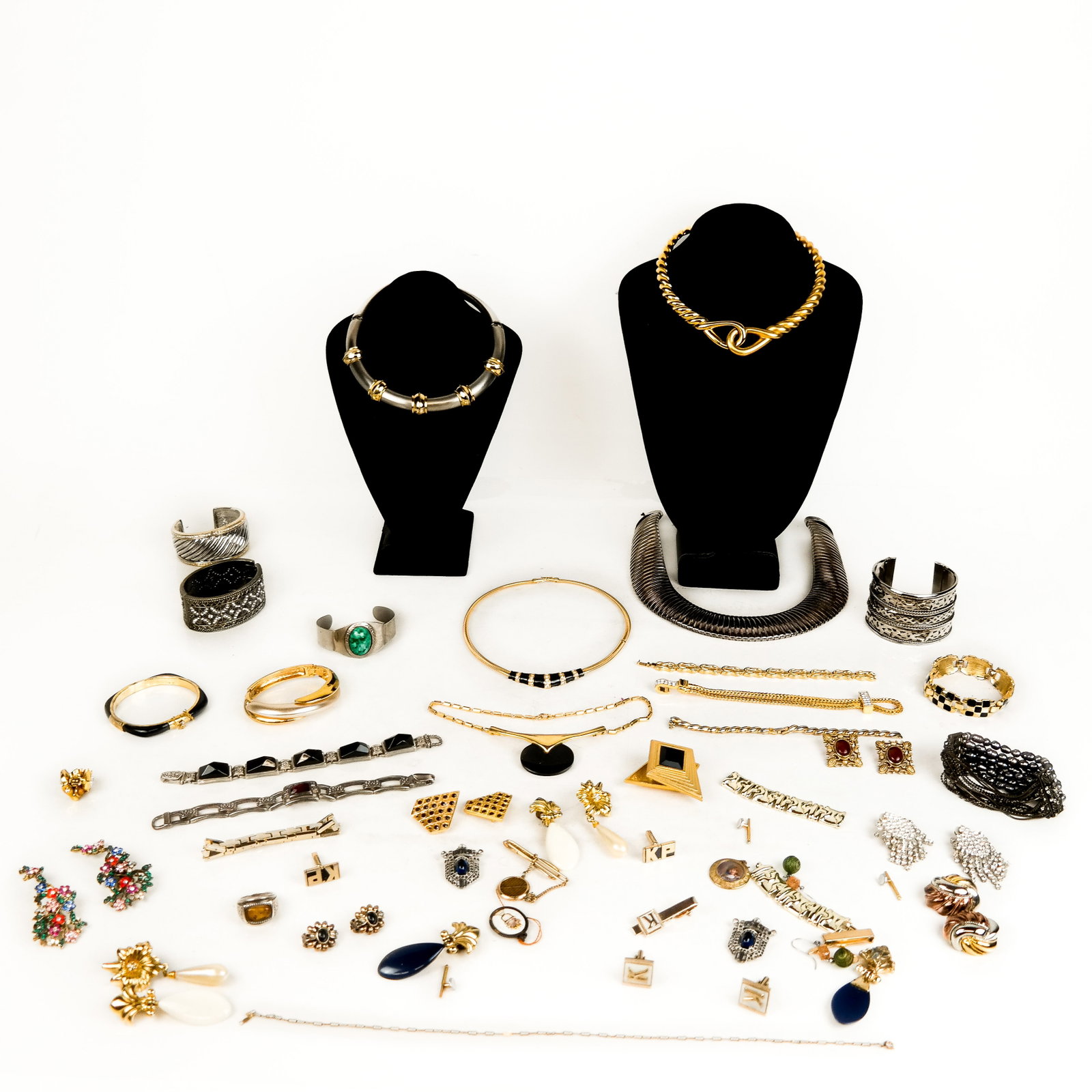 Group of Costume Jewelry: Comprising necklaces, bracelets, cufflinks, tie bars, pendants, some signed Les Bernard Inc, Swank, Idemario