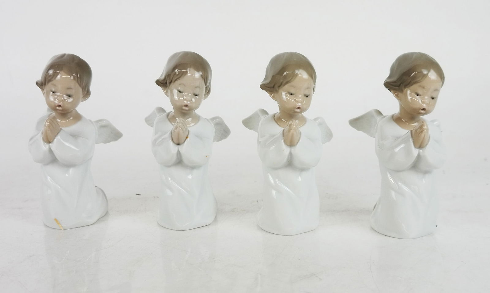 Group of Four Lladro Angel Figurines (1 of 6)