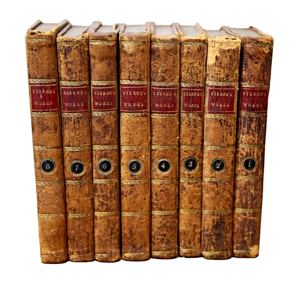 Antique Bindings: Works of Sterne, 1745: 8 volumes, Duncan and Shaw, London dated 1745, full leather book binding with gilt lettering. [6 1/2" x 4 1/4"]. Losses, marks, toning, wear
