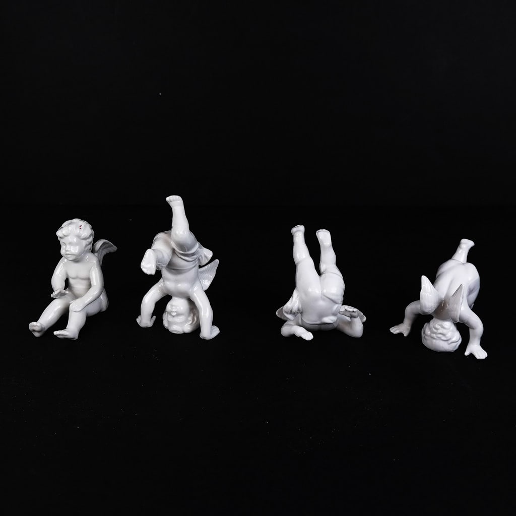 Group of Four Porcelain Cherub Figures (1 of 6)