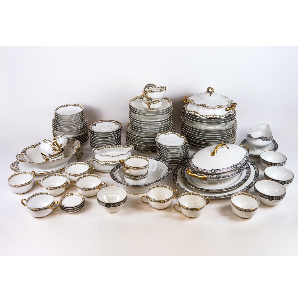 Two Partial Dinnerware Sets: Two porcelain sets, including Limoges "Elite" pattern set with a gravy boat, tureen, two chargers and others (8 pieces), and a Haviland, Co., Limoges set including a tureen, nine dinner plates, eight