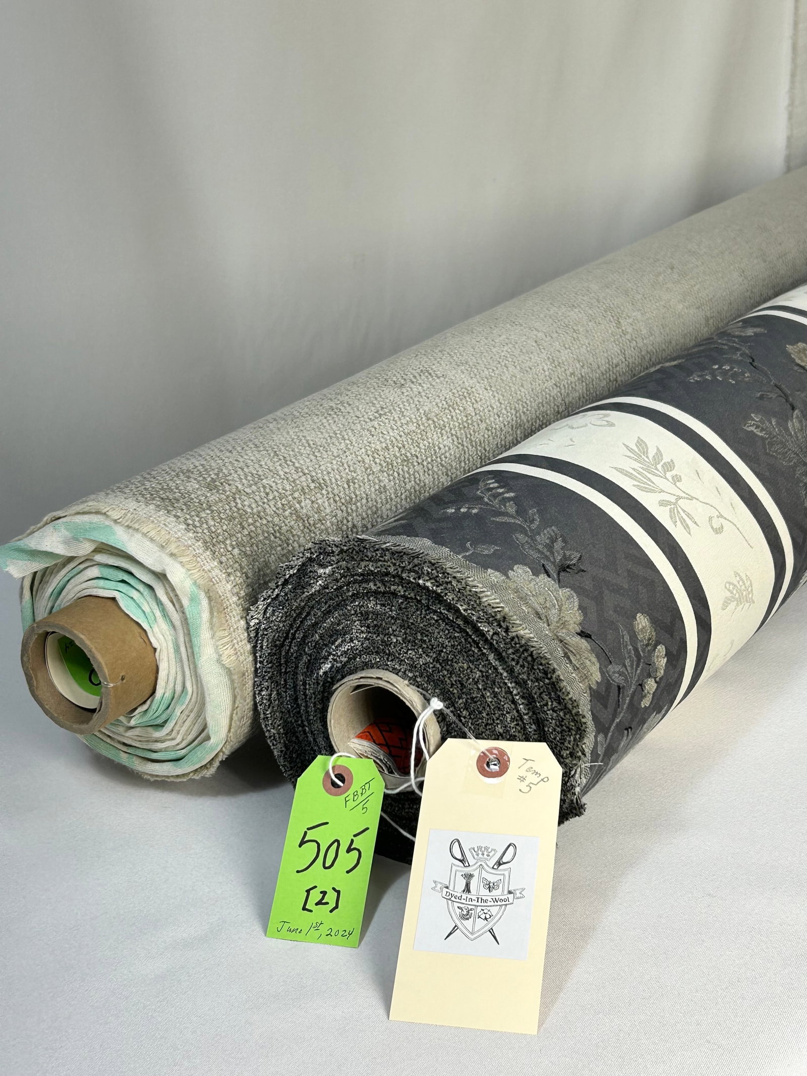 Fret Floral Stripe and Holly Hunt Textured Fabric: 1) 22 yards of Fret Fabrics' "Modern Floral" Italian upholstery stripe, # 47-3, color multi on cinder and ivory, 55" width. Inspired by hand-painted Chinoiserie wallpaper and combined with a subtle ba