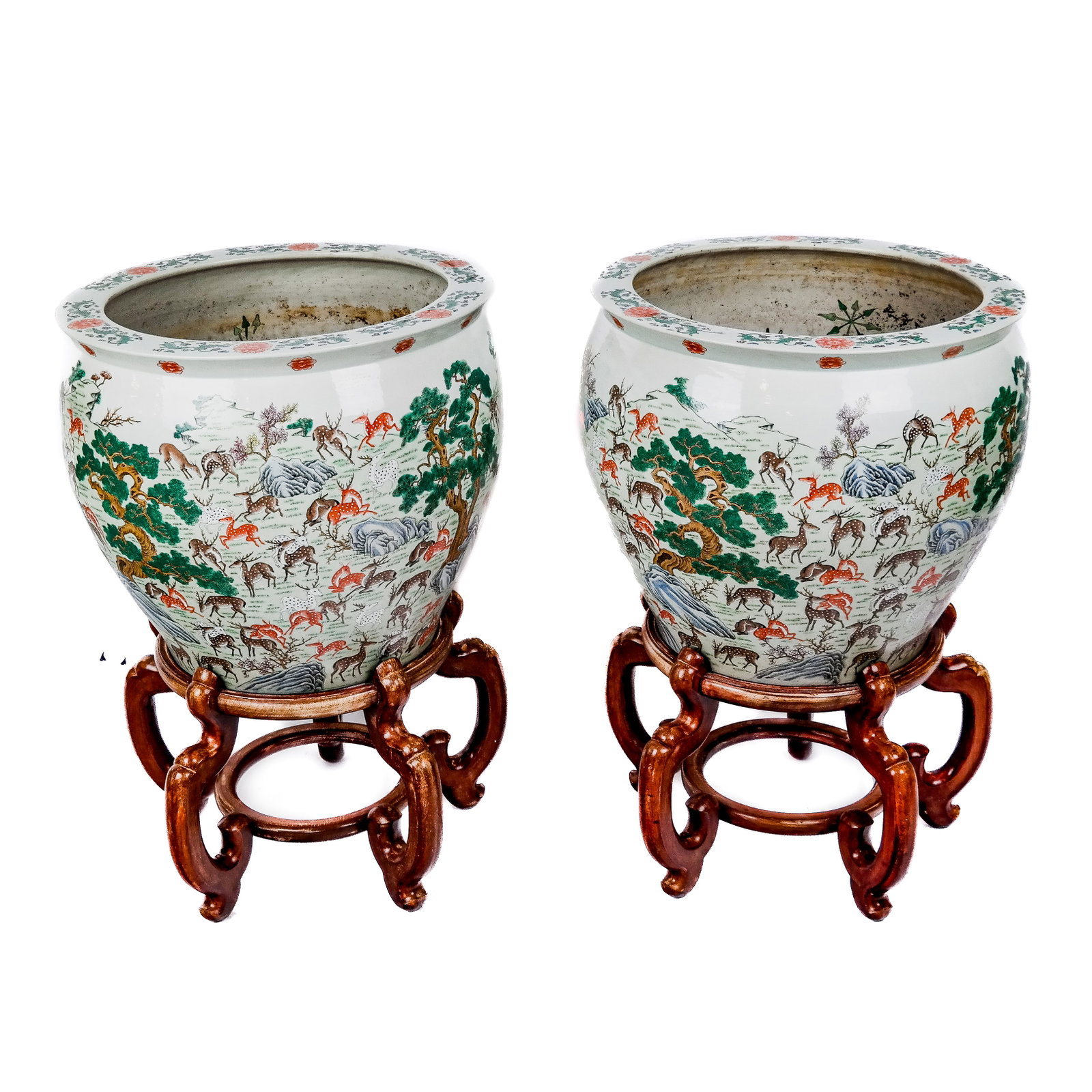 Pair of Chinese Famille Verte Jardinieres & Stands: The exterior decorated with herds of deer amidst a landscape, the interior decorated with koi [31" H x 20 5/8" Diameter]