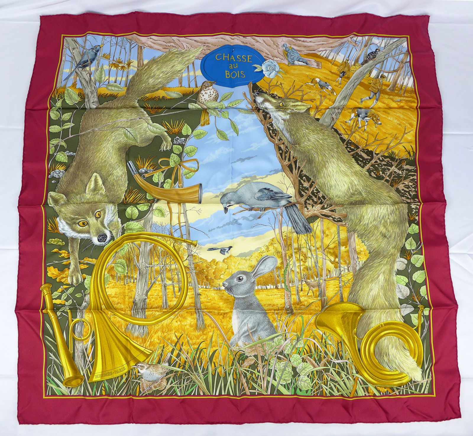 Vintage Hermes Paris Silk Scarf "Chasse au Bois" with box: This is a classic 90cm Carre Hermes Silk Scarf made in Paris dating from the late 80's or 90's. Titled "Chasse au Bois" and is decorated with a Fox Hunting Motif with animals and hunters in the forest