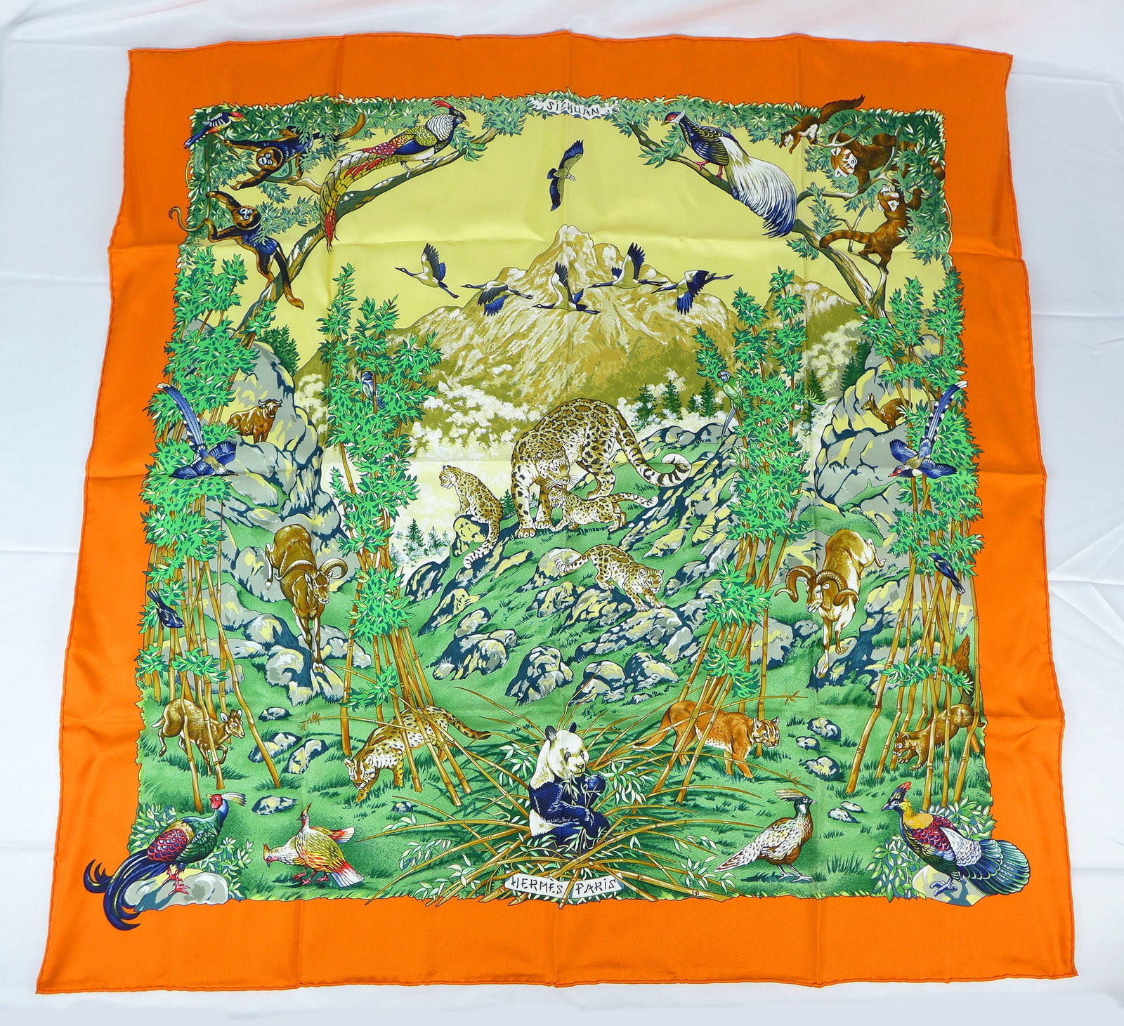 Vintage Hermes Paris Silk Scarf "Sichuan" with box: This is a classic 90cm Carre Hermes Silk Scarf made in Paris dating from the late 80's or 90's. Titled "Sichuan" and is decorated with a Western China landscape of animals in the wild. It was Designed