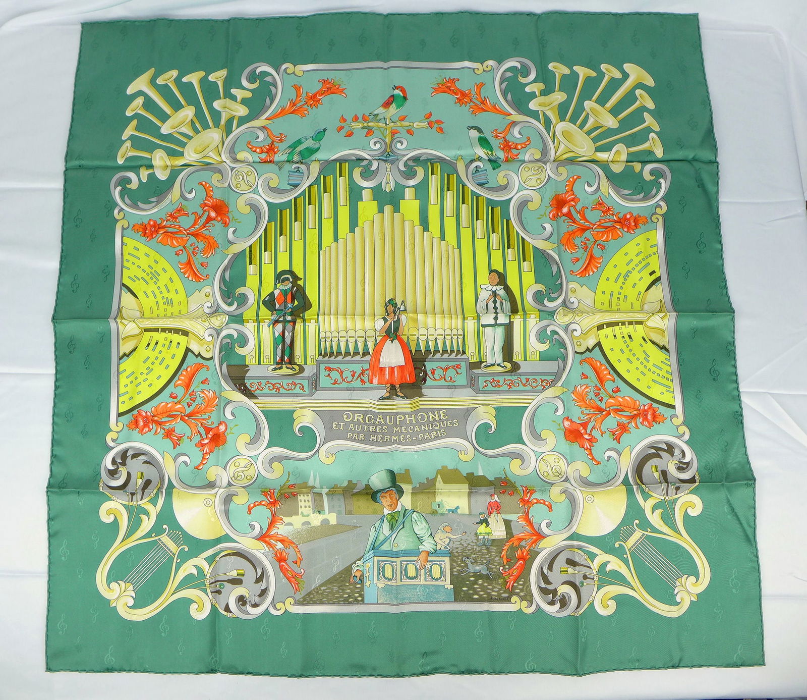 Vintage Hermes Paris Jacquard Silk Scarf "Orgauphone" with box: This is a Jacquard 90cm Carre Hermes Silk Scarf made in Paris dating from the late 80's or 90's. Titled "Orgauphone" and is decorated with a scene celebrating the european musical organ and its influe