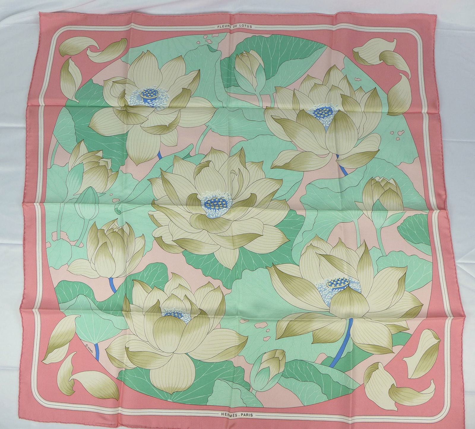 Vintage Hermes Paris Silk Scarf "Fleurs De Lotus" with box: This is a classic 90cm Carre Hermes Silk Scarf made in Paris dating from the late 80's or 90's. Titled "Fleurs De Lotus" and is decorated with a group of flowering pink lotus flowers. It was Designed