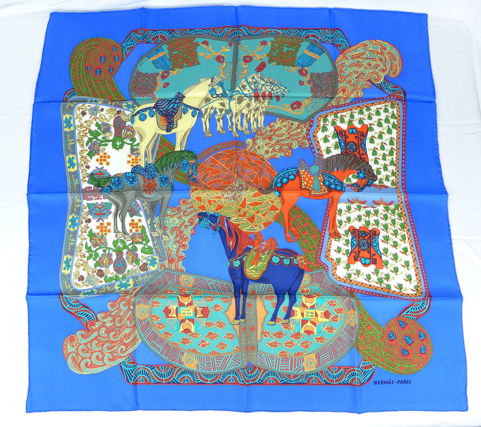 Vintage Hermes Paris Silk Scarf "Art des Steppes" with box: This is a classic 90cm Carre Hermes Silk Scarf made in Paris dating from the later 80's or 90's. Titled "Art des Steppes" and is decorated with a traditional Chinese Mongolian design of Horses from th