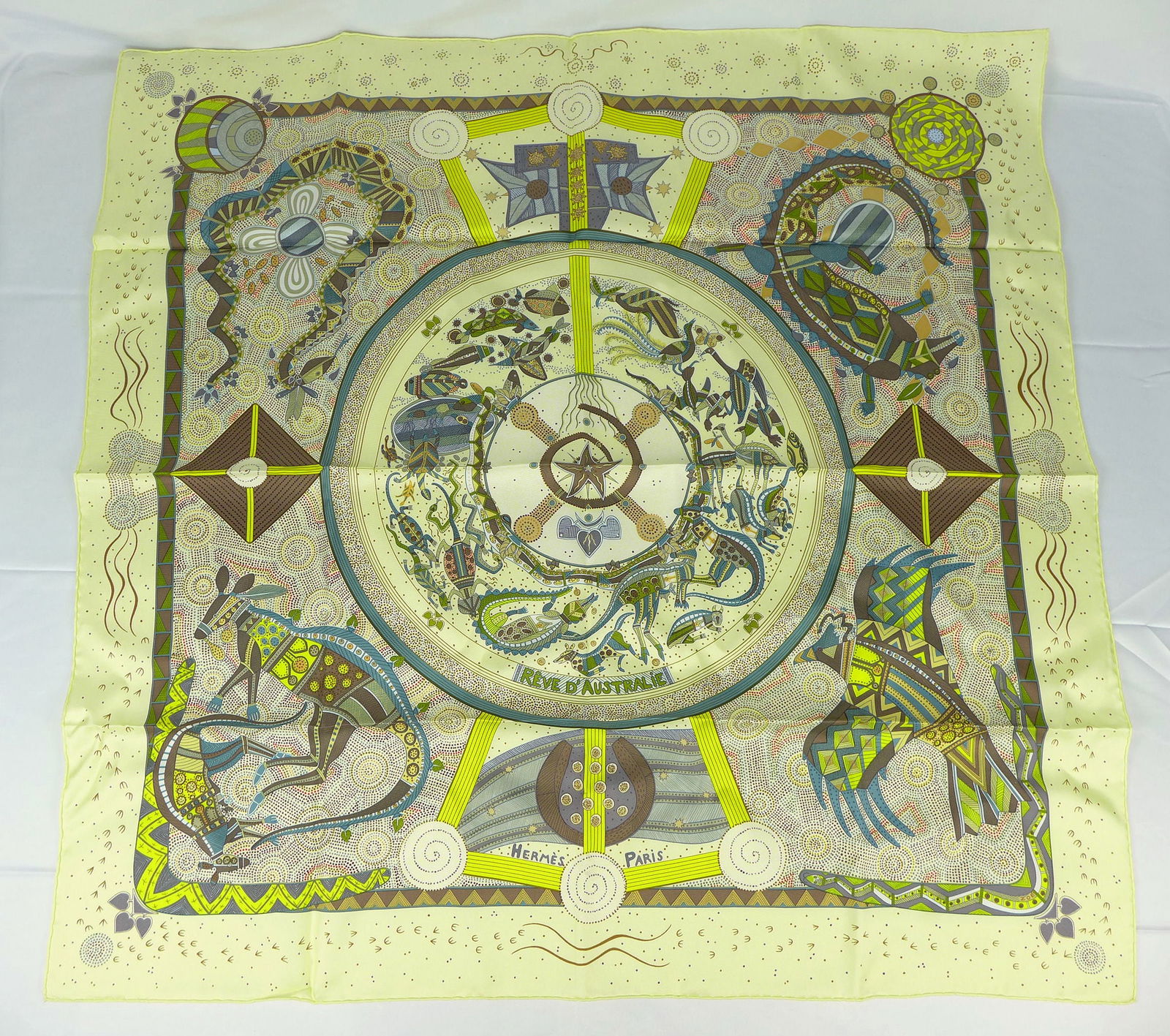 Vintage Hermes Paris Silk Scarf "Reve d'Australie" with box: This is a classic 90cm Carre Hermes Silk Scarf made in Paris dating from the later 80's or 90's. Titled "Reve d'Australie" and is decorated with an Aboriginal dot design of animals and symbols from Au