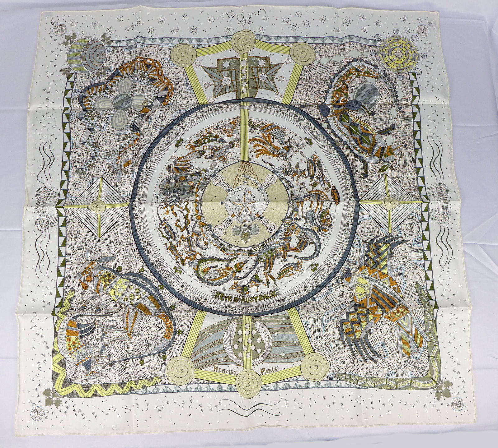 Vintage Hermes Paris Silk Scarf "Reve d'Australie" with box: This is a classic 90cm Carre Hermes Silk Scarf made in Paris dating from the later 80's or 90's. Titled "Reve d'Australie" and is decorated with an Aboriginal dot design of animals and symbols from Au