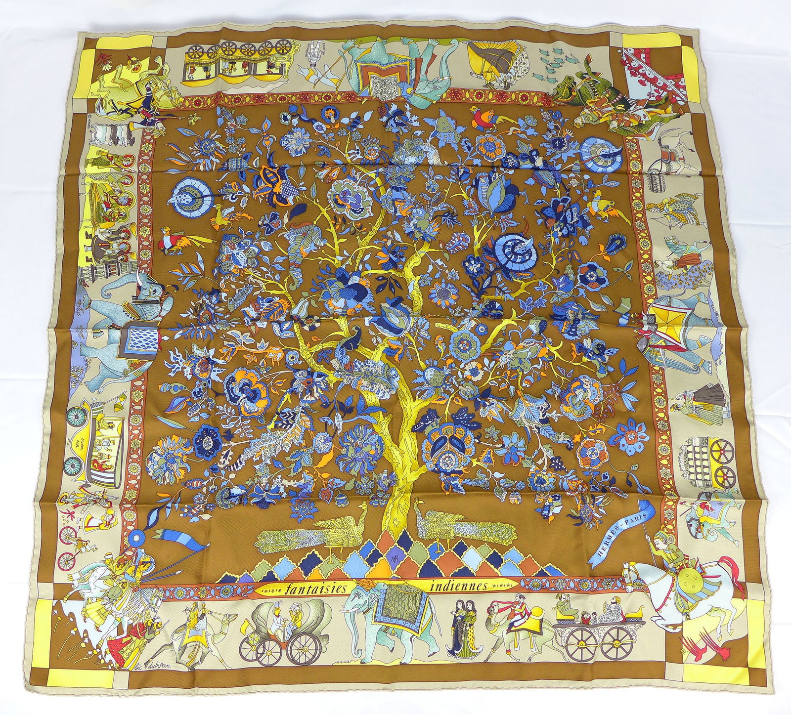 Vintage Hermes Paris Silk Scarf "Fantaisies Indiennes" with box: This is a classic 90cm Carre Hermes Silk Scarf made in Paris dating from the later 80's or 90's. Titled "Fantaisies Indiennes" and is decorated in india inspired art from its history with a giant tree
