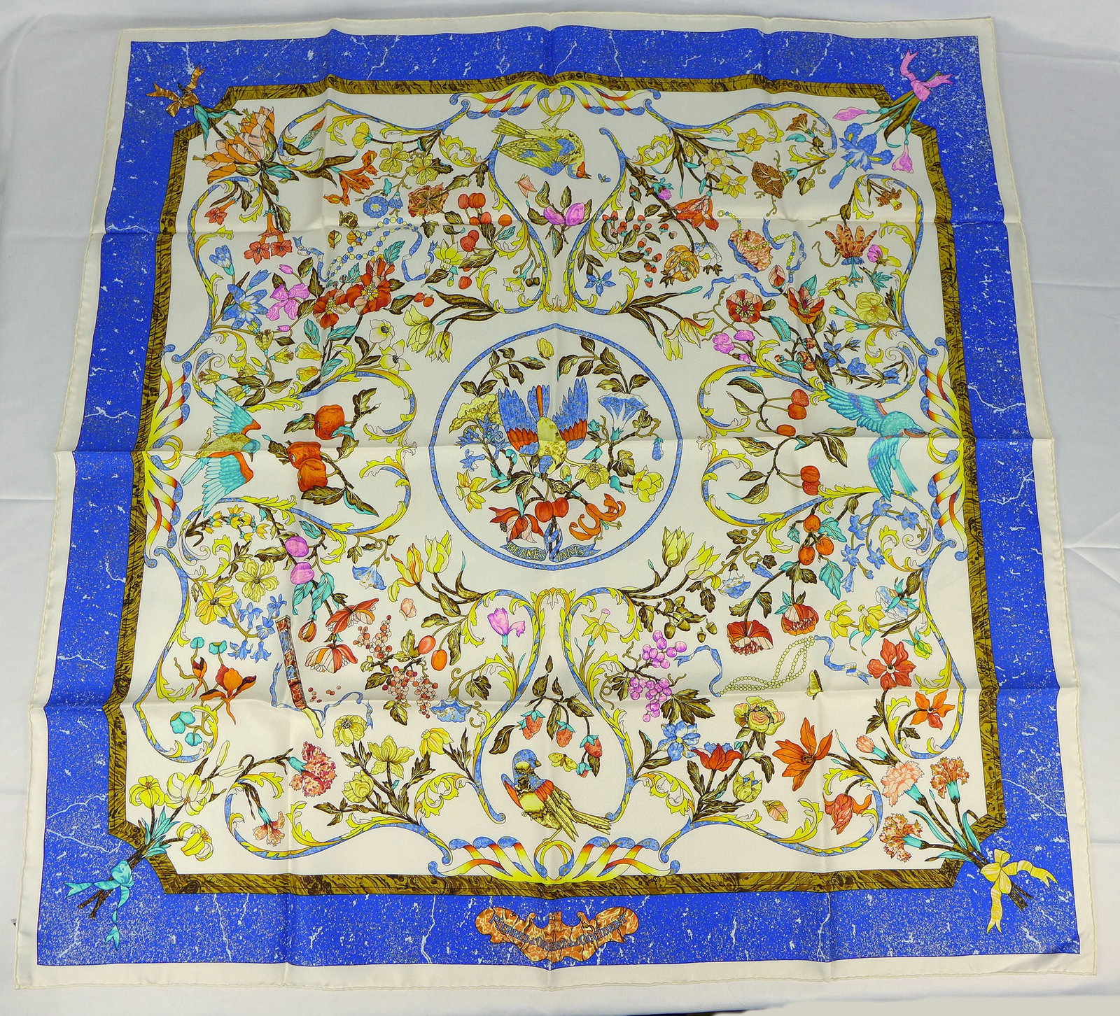 Vintage Hermes Paris Silk Scarf "Pierres d'Orient et d'Occident" with box: This is a classic 90cm Carre Hermes Silk Scarf made in Paris dating from the later 80's or 90's. Titled "Pierres d'Orient et d'Occident" and is decorated with an inlaid precious stone design of birds 