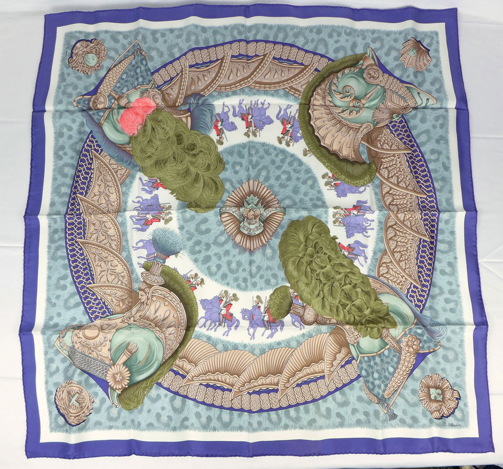 Vintage Hermes Paris Silk Scarf "Casques et plumets" with box: This is a classic 90cm Carre Hermes Silk Scarf made in Paris dating from the later 80's or 90's. Titled "Casques et plumets" and is decorated with a 4 large ornamental helmets with a procession of sol