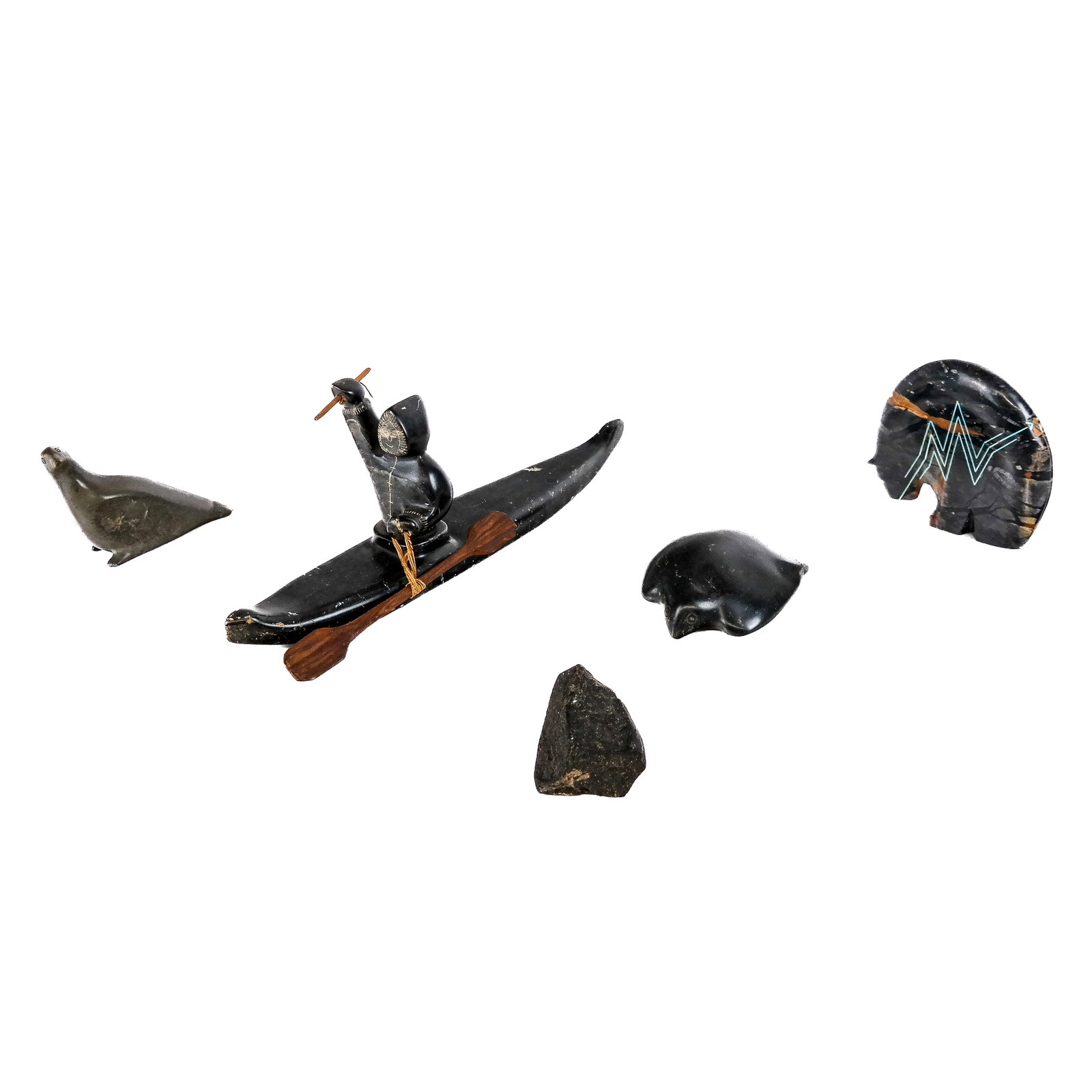 Five Inuit-Style Sculptures: Group of five (5) Native American and Northwestern sculptures, including a hunter in a kayak (signed illegibly), two birds, a bear, and a fragment. [Largest: 5" H x 14" W x 2 1/2" D].