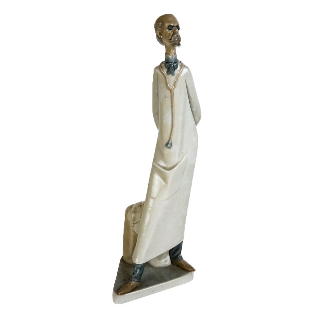 Lladro Sculpture of a Doctor: Lladro, Spain, porcelain sculpture of a doctor. [14" H x 4 1/2" W x 4 1/2" D]. In good condition.