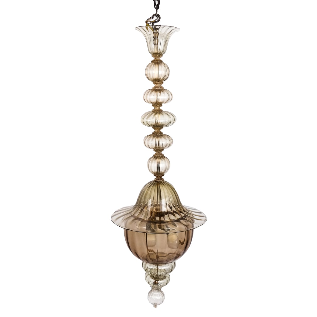 Venetian Murano Blown Glass Chandelier: Venetian Murano blown glass chandelier, 2nd half 20th century, after the "Doge" model by Venini, with pendant lobed orb- and bell-form sections in straw/amber glass, unsigned. [50" H x 17" Diam.]. Are