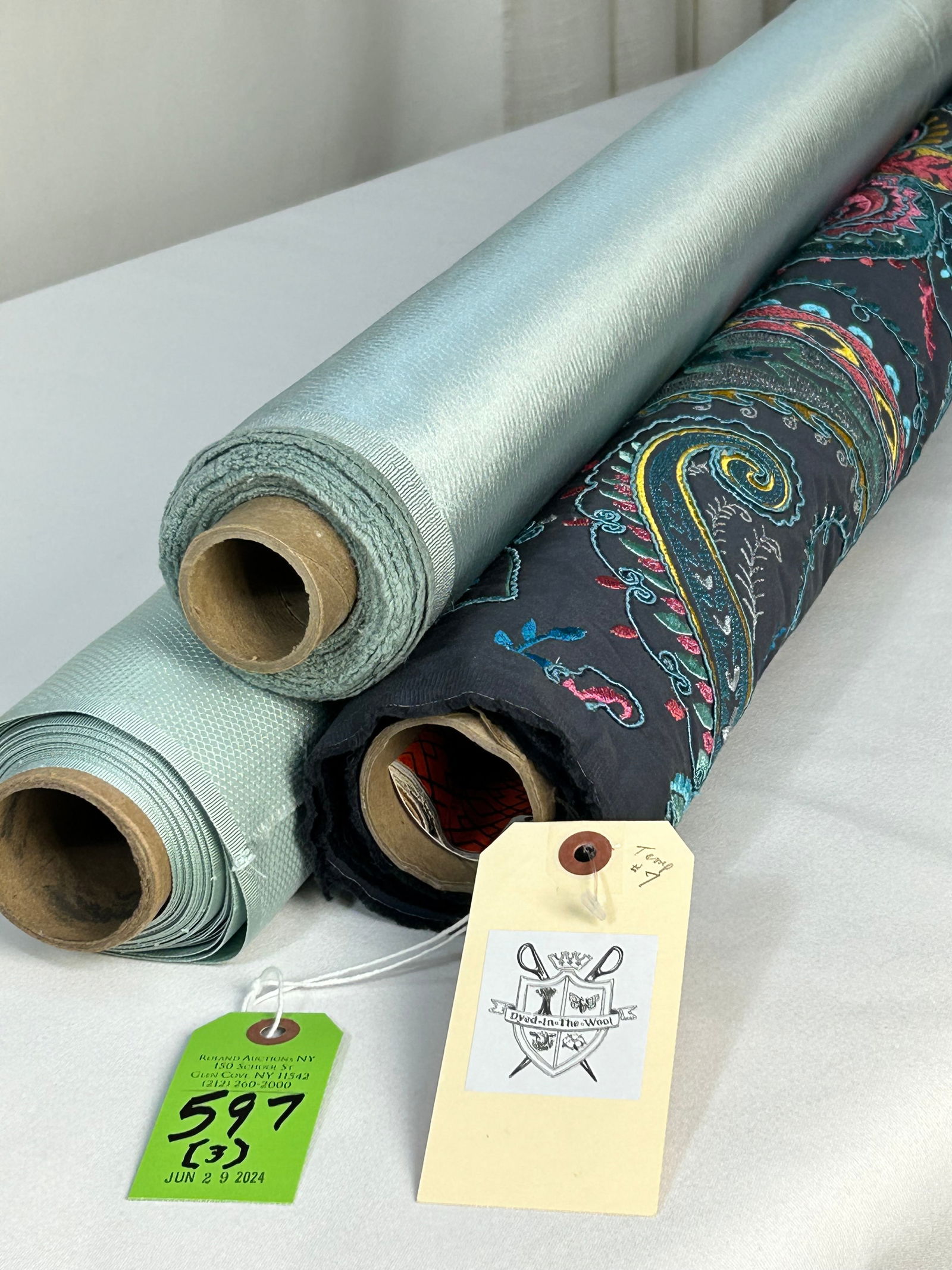 Osborne & Little, Stark and Villa Nova Fabrics: 1) 2 yards of an embroidered paisley design by Matthew Williamson for Osborne & Little called "Yamuna", #F6946-01, in primary colors on anthracite, 54" width. Viscose embroidery on a cotton satin grou