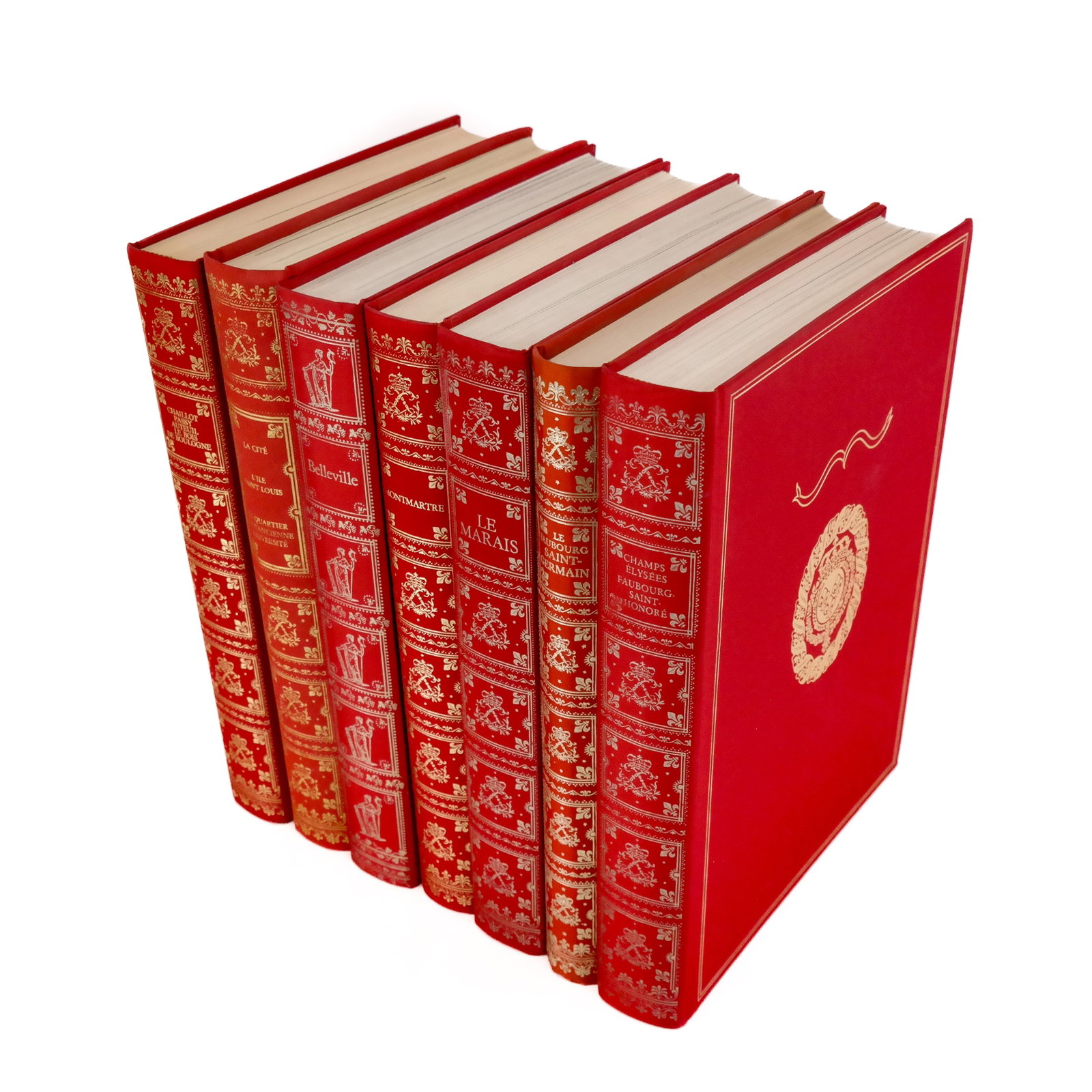 French Bindings: Paris et Ses Quartiers (7): Paris et Ses Quartiers, 7 volumes, red cloth with gilt and silver lettering and armorials, Henri Veyrier, Paris, circa 1980s. Provenance: From the personal library of Thierry Despont. [13 5/8 x 9 7/8 