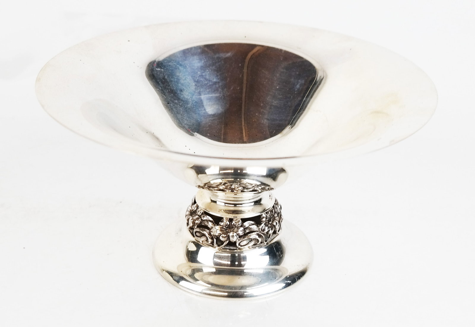 Sterling Silver Compote: With pierced and foliate design, signed and numbered on the base, 7.75 ozt. [Height 3 3/4 inches, diameter 7 inches]