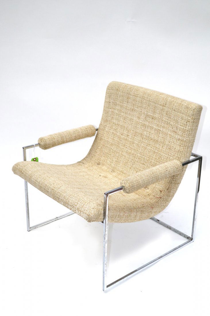Milo Baughman for Thayer Coggin Armchair: Chromed steel open armchair with continuous curved seat and back. 26" W x 26 1/4" D x 28 1/4" H. Light pitting on supports, otherwise in good condition.