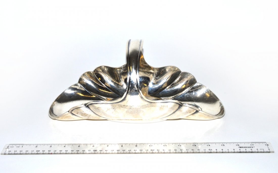 Buccellati Sterling Silver Basket, 21 ozt: Flare form scallop edge basket. Buccellati- Italy. 21 ozt. 13 3/4"W x 6 1/4"D x 6 1/2"H.