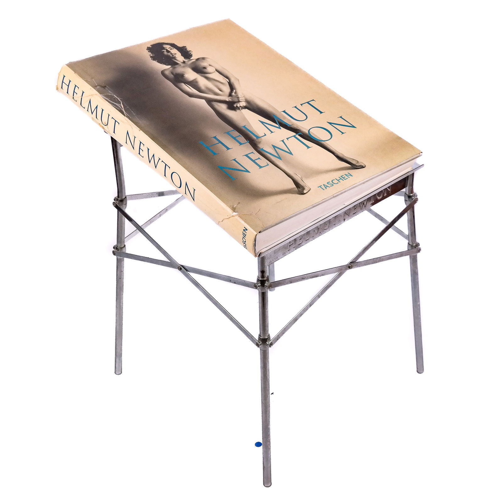 BOOK: Helmut Newton's "SUMO" Book & Stand: Helmut Newton's "SUMO" book, Newton, June (Editor), published by Taschen, Monte Carlo, 1999; signed limited edition # 01,612/10,000, with original chrome-plated Philippe Starck bookstand. [Book: 27 7/