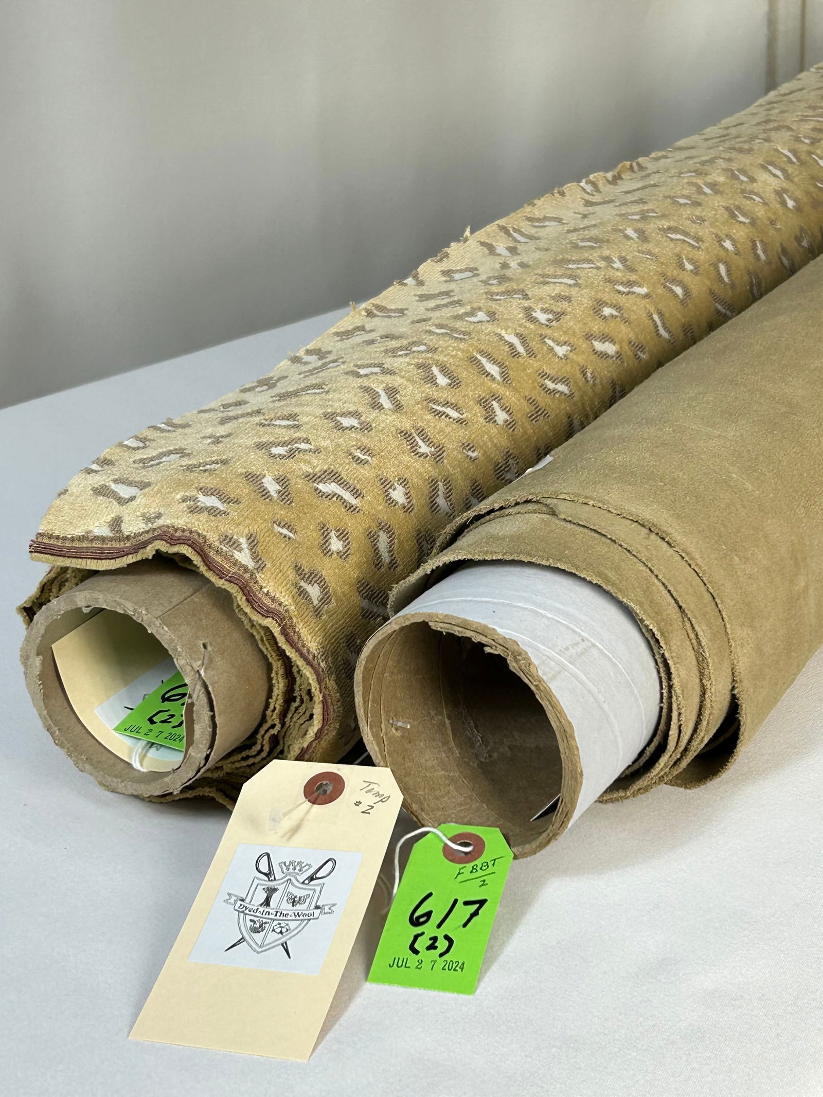 Edelman Suede Leather and Linen Velvet Fabric: 1) 28 square feet of 1st quality Edelman "Royal Suede" leather in colorway "Paper bag". The two 14 square foot lengths are rolled properly together onto one tube. The suede is double sided. 2) 3 yards