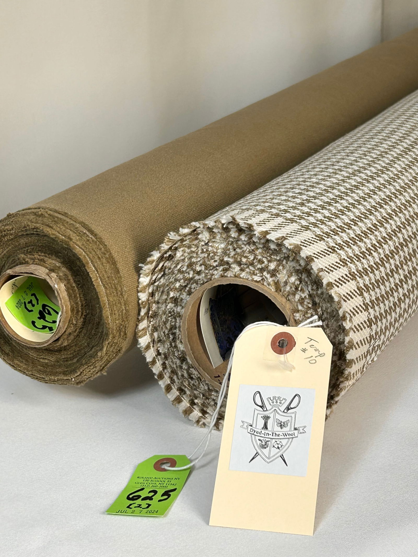 Italian Lined Houndstooth and Linen Canvas Fabrics: 1) 10 1/4 yards of Italian linen houndstooth upholstery in dark khaki and ivory, 53 1/2' width. In great condition! 2) 11 yards of European linen canvas in a dark khaki coloration, 58 1/2" width. The