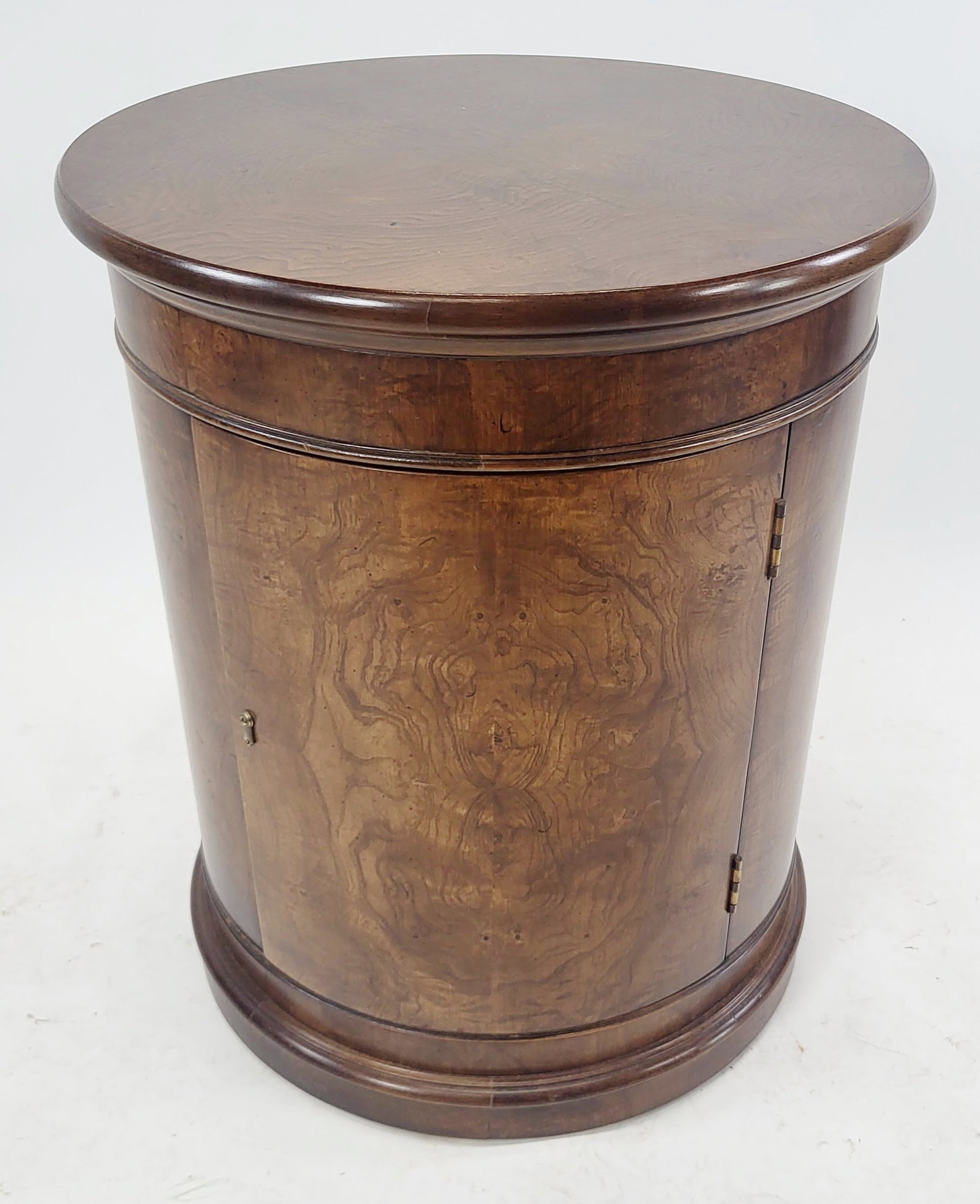 Round Burlwood Veneer Cabinet: Round burlwood veneer cabinet. [25 1/2" H x 21 1/2" Diam.].