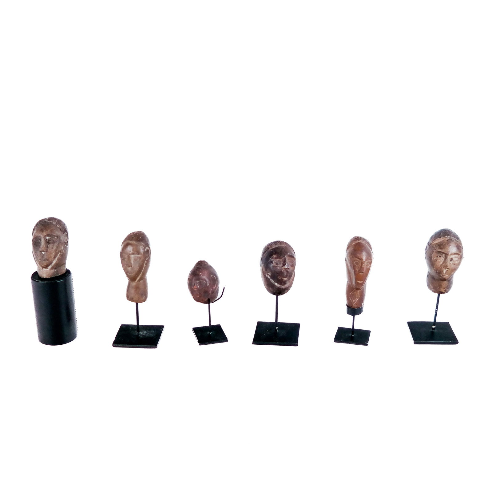 Group of Carved Stone Heads (1 of 6)