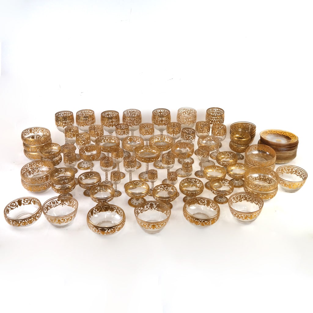 Continental Gilt Glass Partial Service (70+ Pcs): Continental gilt glass partial service, probably French or Austrian, late 19th century, with scrolling foliate details, including wine goblets, champagne coupes, liqueur and cordial glasses, bowls and
