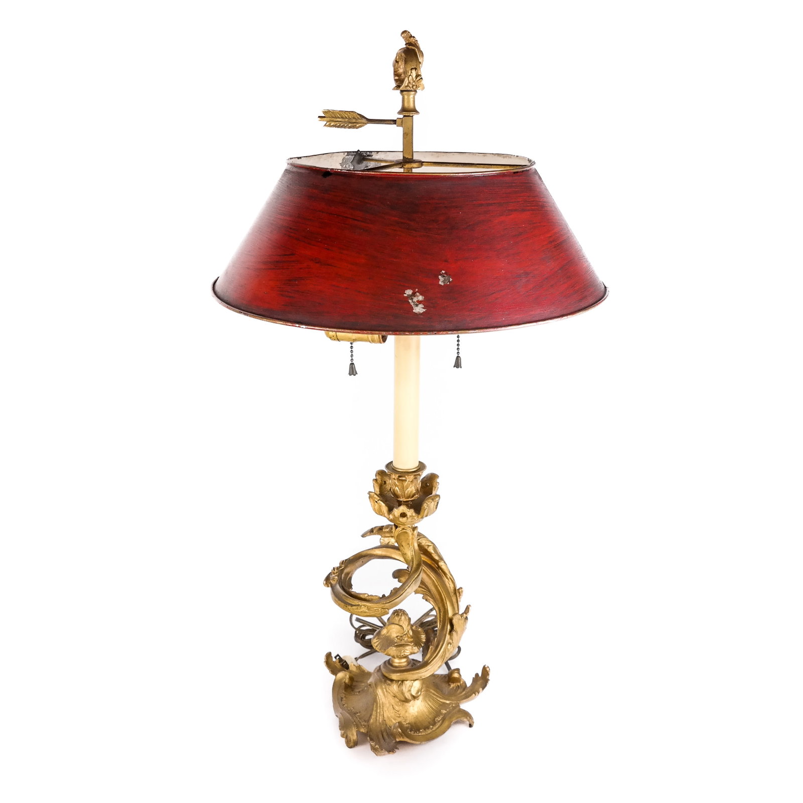 Louis XV-Style Gilt Bronze Bouillotte Lamp: Louis XV-style gilt bronze bouillotte lamp, having a tole shade over an exaggerated French rocaille scrolling branch support, in the manner of Jacques Caffiere or Juste-Aurele Meissonnier; unmarked. [