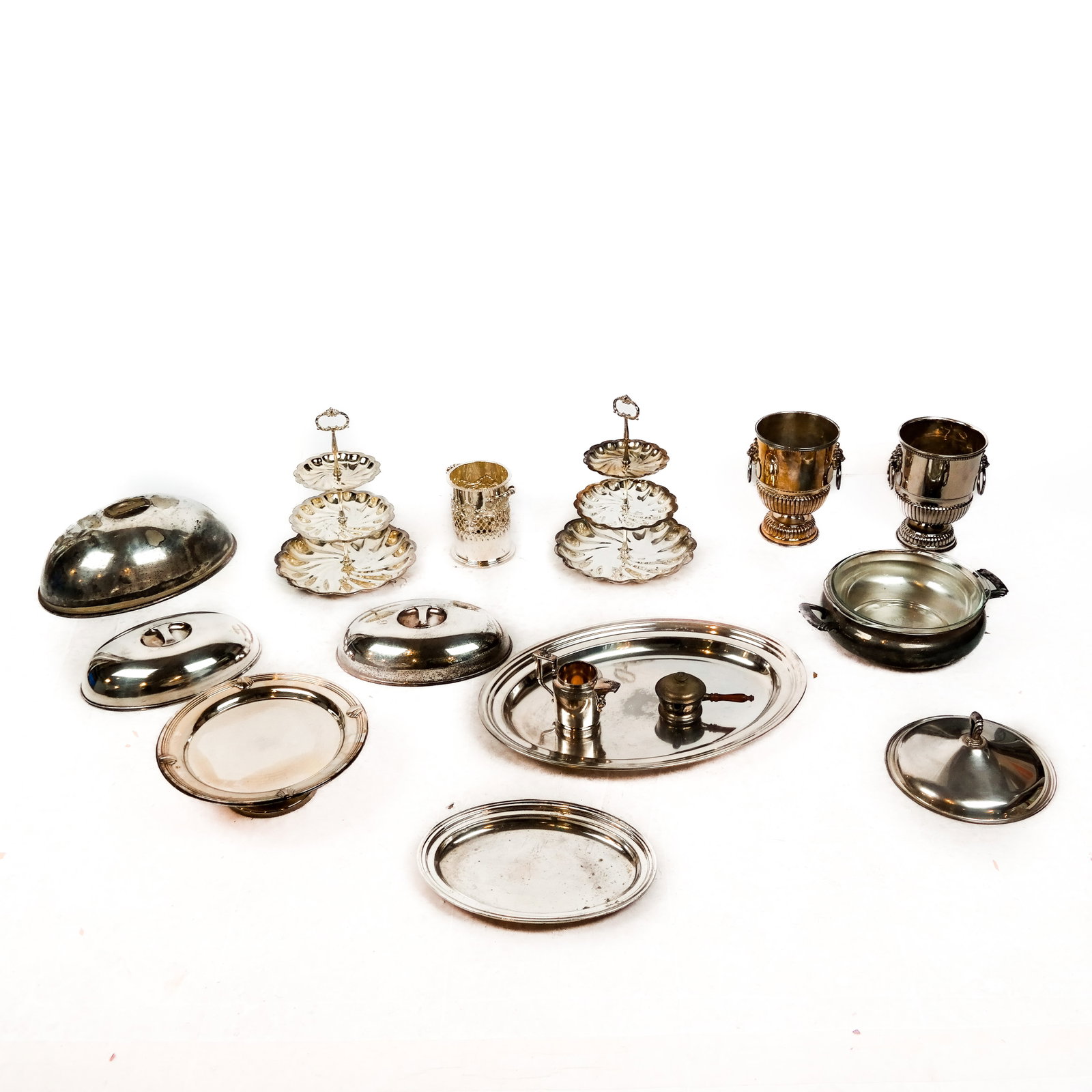 Assorted Large Silver Plate Serving Items: Assortment of silver plate serving items, including covers, wine coolers, trays, etc. Some dents; sold "as-is".