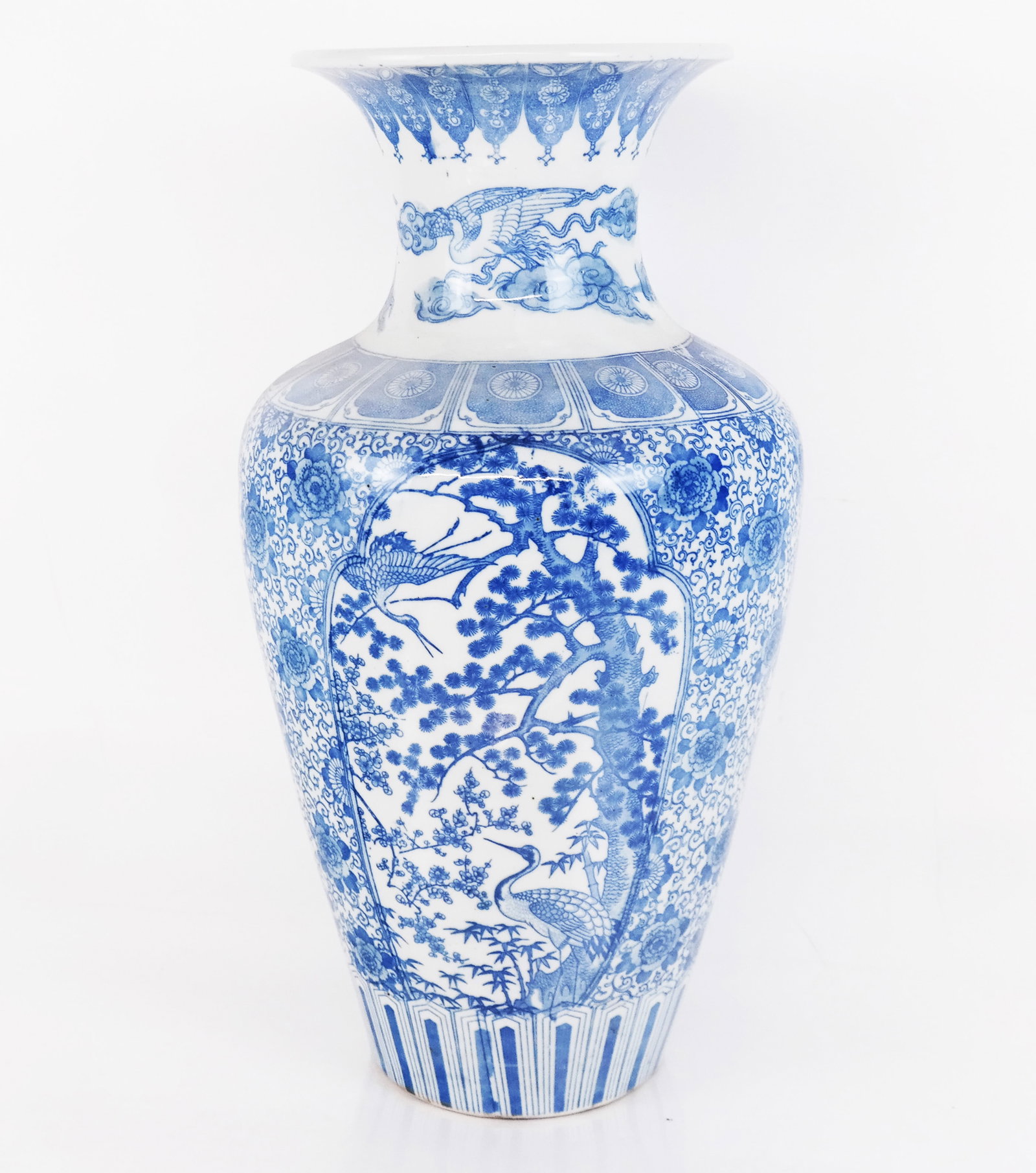 Asian Blue & White Porcelain Vase: Asian blue and white porcelain vase, Japanese/Chinese, decorated with clouds and cranes, depicting landscape scenes alternating with stylized flowers. [18" H x 10" Diam.].