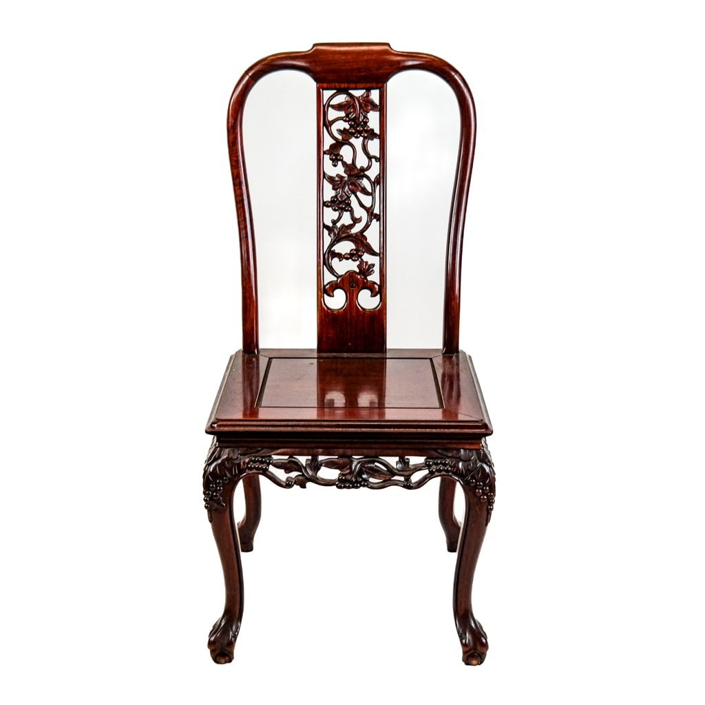 Chinese Carved Hardwood Side Chair: Chinese carved hardwood side chair, the pierced reticulated back and apron with leaf and berry details. [37" H x 18 1/2' W x 20" D]. Overall with scattered marks and wear.