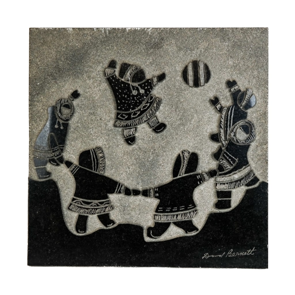 David BERNETT: Child - Granite Relief: An Inuit-style relief panel by David Bernett, titled "Arctic Playtime", signed lower right. [12" x 12"]. In good condition.