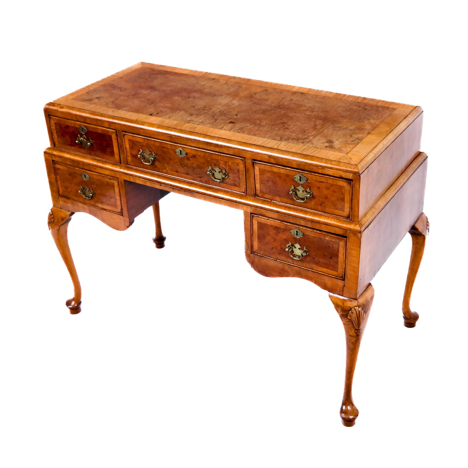 George I Yew Wood Lowboy: Early 18th century George I yew wood lowboy, the top and drawers with burl panels over carved shell-accented cabriole legs with pad feet. [30 3/4" H x 44" W x 23" D]. Case with age cracks; areas of re