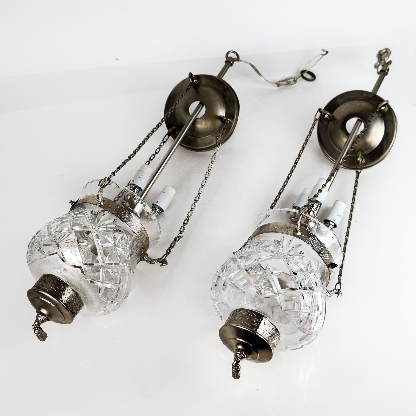 Pair of Cut Glass Pendant Lanterns: Pair of cut glass pendant lanterns. [16" H x 7" Diam.].