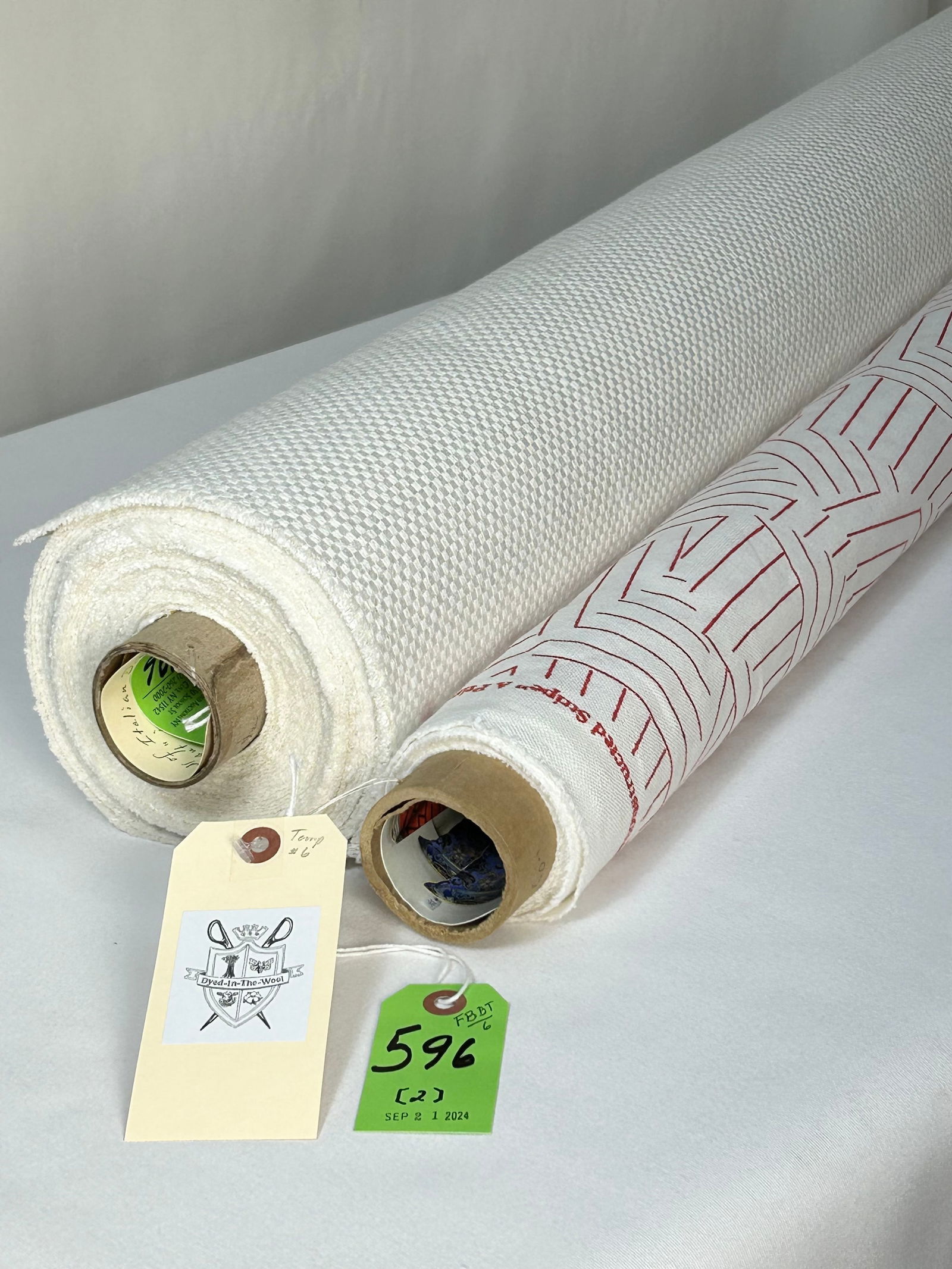 Schumacher Print and Dedar's Linen Blended Fabric: 1) 2 3/4 yards of Schumacher's red-on-white "Deconstructed Stripe" print in a linen and cotton blend, designed by Miles Redd, at a 54" width; the design repeats are 18" vertical by 13 1/2" horizontal.