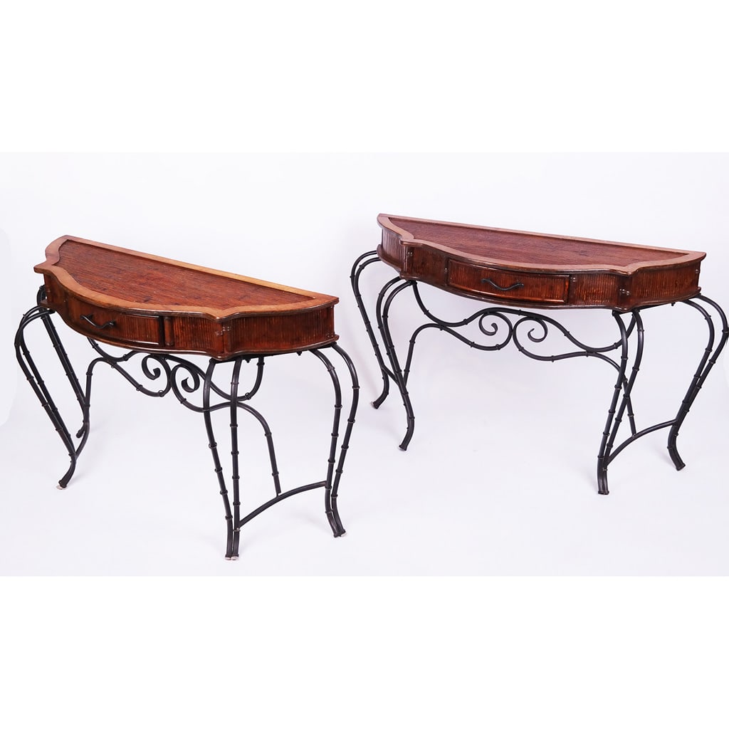 Tommy Bahama Faux Bamboo Consoles (2): Pair of 20th century faux bamboo and iron single-drawer console tables. [30" H x 52" W x 14 3/4" D]. Locate at the Warehouse