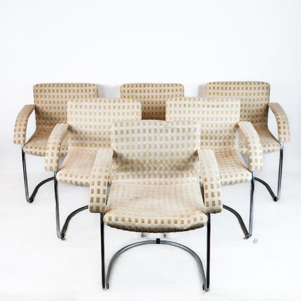 Italian Mid-Century Modern Armchairs (6): Six (6) Italian mid-century modern armchairs, "Lens", with upholstered cushions on chromed tubular frames, probably designed by Giovanni Offredi, bearing Saporiti Italia label to base. [32" H x 26" W