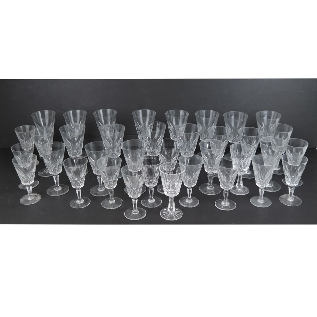 Baccarat French Crystal Stemware, Others (35): 33 pieces of Baccarat French cut crystal stemware, in the "Carcassone" pattern, comprising water goblets and wine glasses, together with two Waterford Irish crystal glasses; most marked to base. 35 pi
