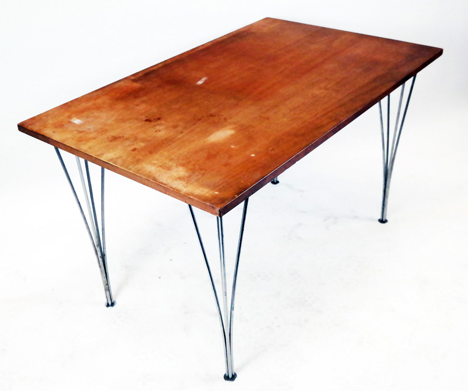 Fritz Hansen Mid-Century Dining Table/Desk: Fritz Hansen mid-century modern dining table/desk, Danish, designed by Piet Hein, Bruno Mathsson and Arne Jacobsen, the rectangular top on metal tubular supports. [27 5/8" H x 47 1/4" W x 29 5/8" D].