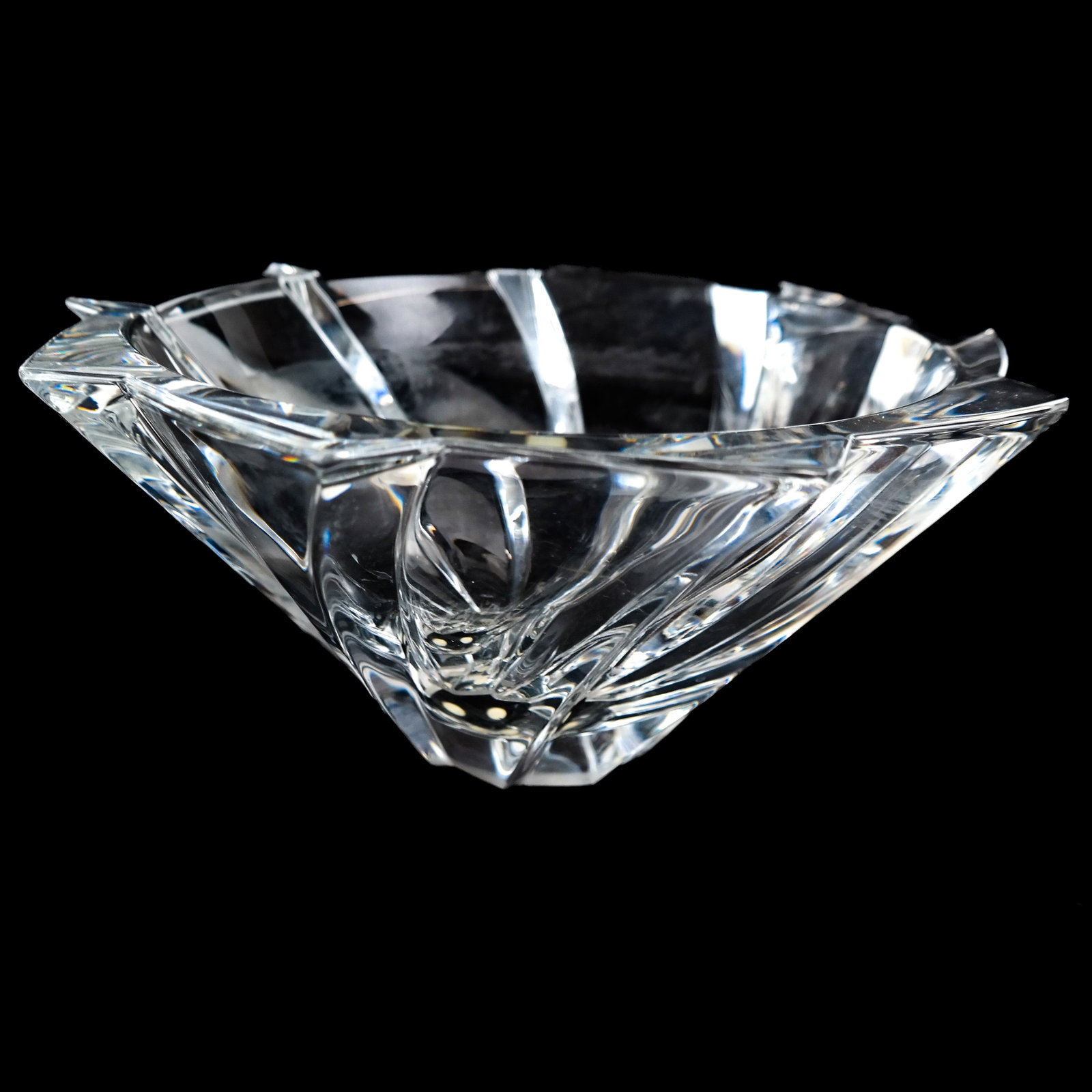 Baccarat French Crystal "Objectif" Bowl: Baccarat French crystal "Objectif" bowl, designed with a pattern representing the opening of a lens diaphragm. [4 3/4" H x 10 1/8" Diam.]. Light residue; applied felt to base; light scuffs and wear.