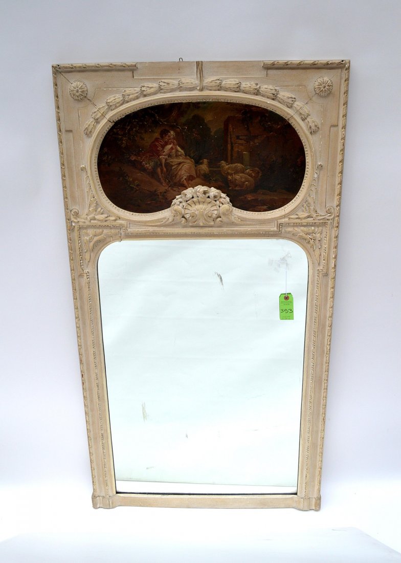 19th C. Trumeau Mirror: Features oval oil on board depicting young lovers in a pastoral scene with goats. Cracking to frame and chips to painted scene. 31 1/2" x 58".