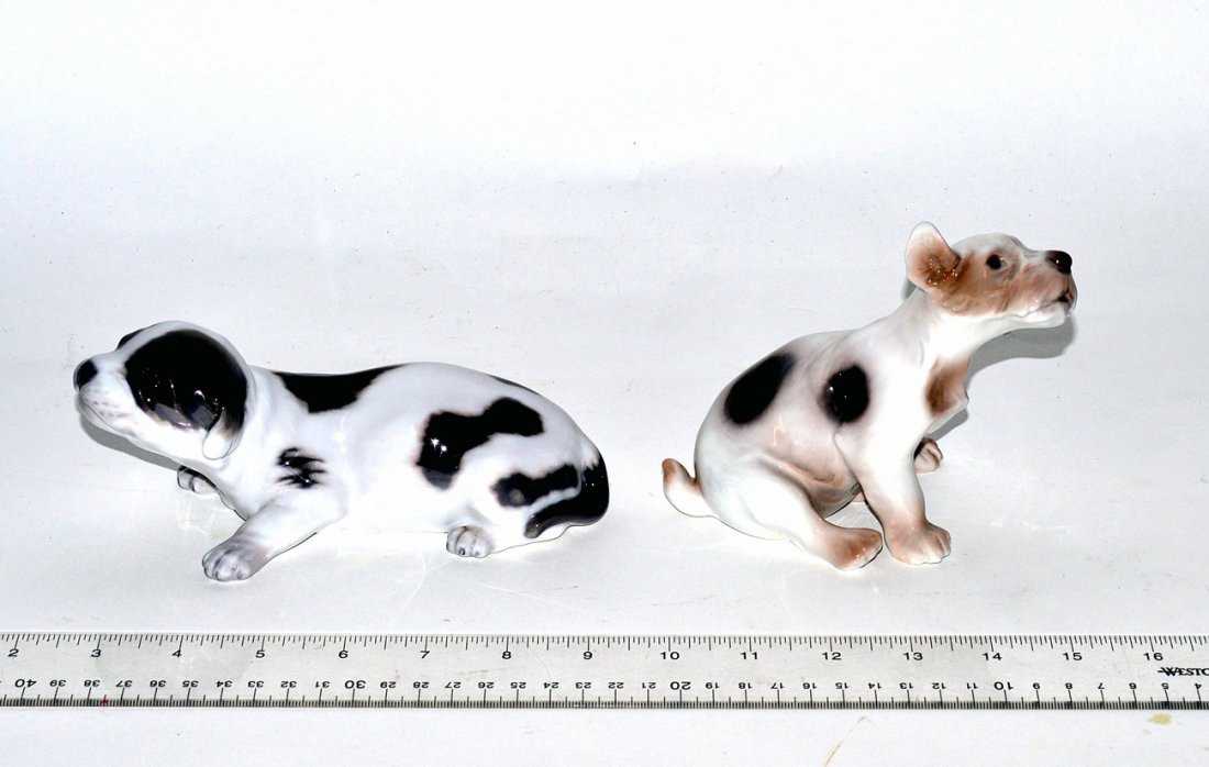 Two Porcelain Dogs, Denmark: One Royal Copenhagen, the other B&G, Denmark. Good condition. 3"-4".