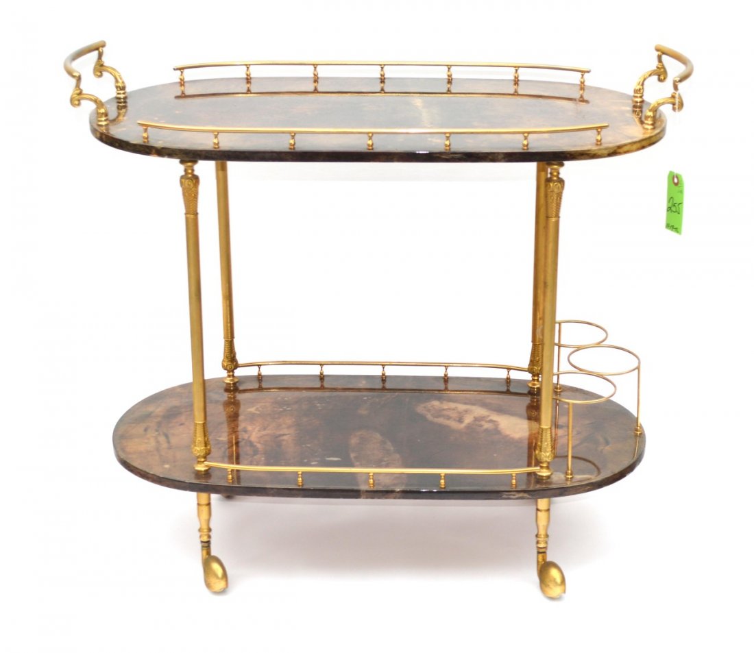 Smoked Lacquered Tea Cart: Brass two tier tea cart, galleries on each tier, on casters. 33 1/2"W x 16"D x 29"H. Some wear.