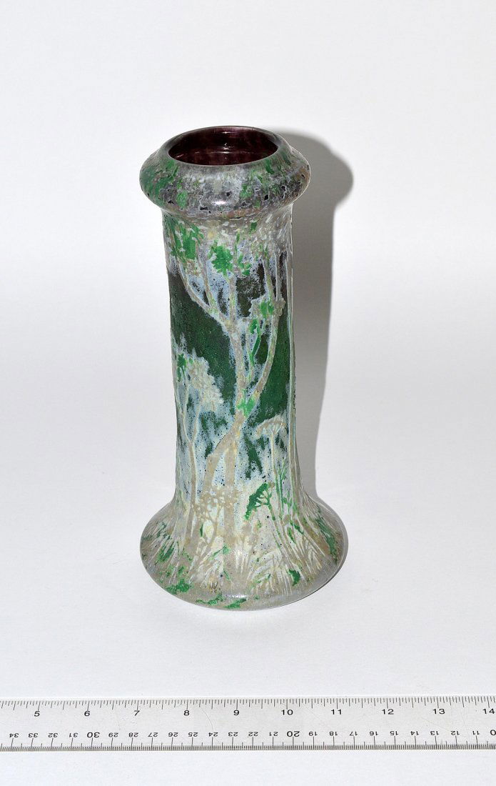Daum Nancy Vase: Overlay art glass vase with trees. Signed Daum Nancy. 10"H. In good condition.